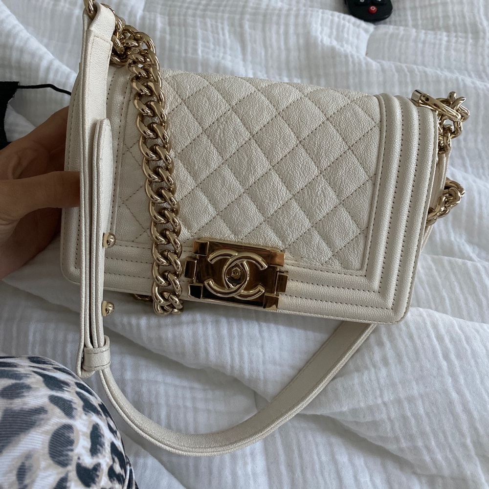 White small Chanel boy bag.